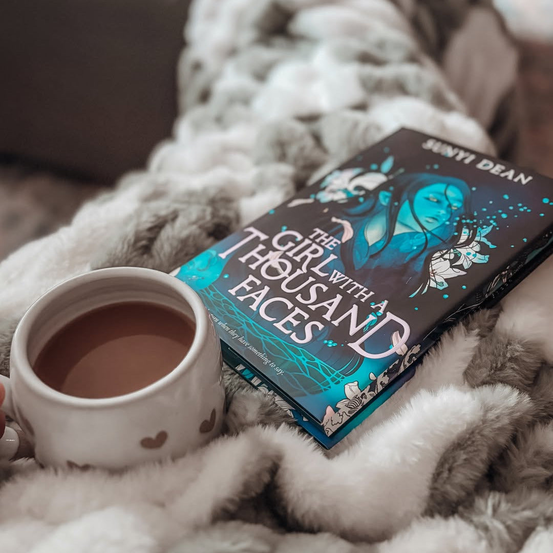The Girl with a Thousand Faces by Sunyi Dean
